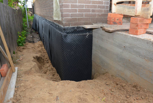 Happy homeowners after waterproofing job in Elwood